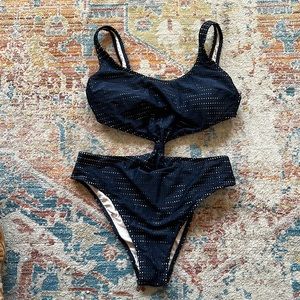 Worn once cut out one piece.